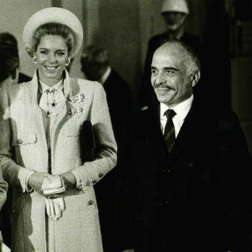 HRH The King and Queen of Jordany during an official ceremony, wearing the double Repossi brooches, 1987